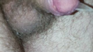 Small hairy cock pissing