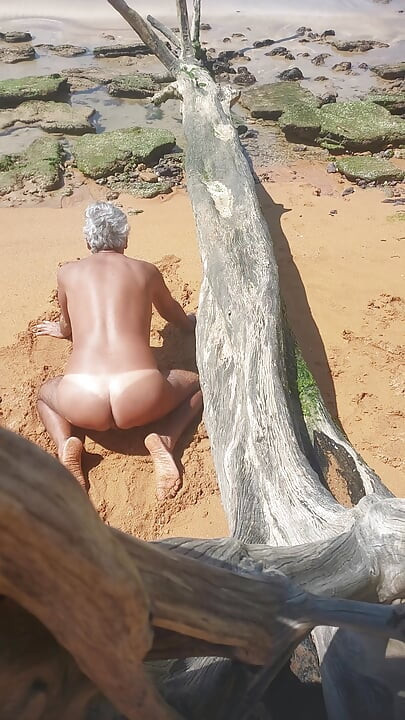 Ladysilva on the beach naked showing off her tanned sexy ass