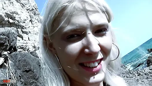 Sexy blonde giving her ass on the beach