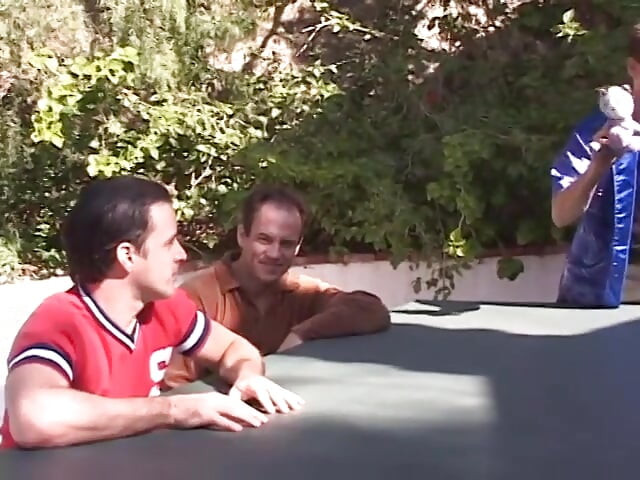 Horny black haired beauty sucks and fucks four men by the pool