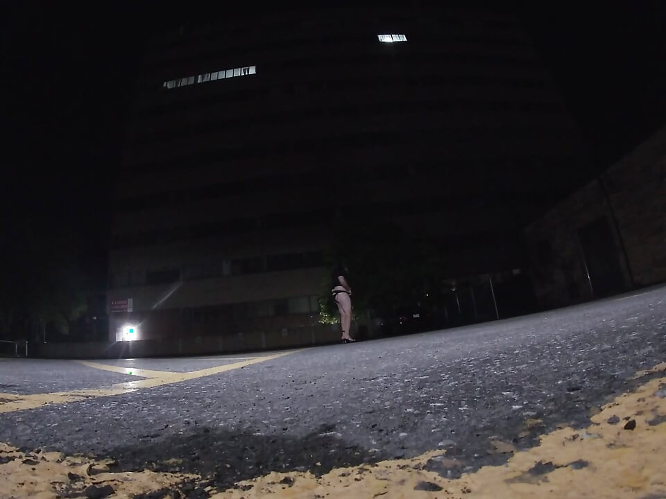 Solo feminized Mature CD goes for a walk in a parking lot