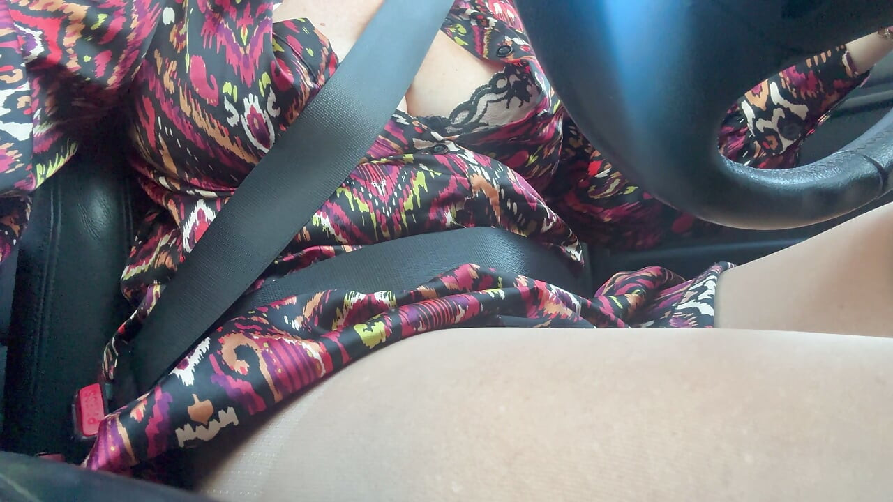 Sexy stepmom drives home and teases us with her big tits, which are practically popping out of her bra.
