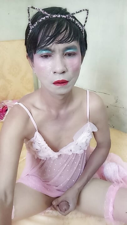 Oanh Le transgender wearing a sexy robe masturbating happily