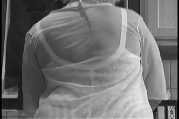 Mature wearing white rago girdle