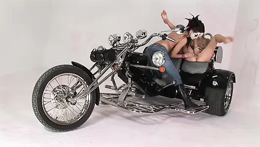 Lesbian Moto Riders with Painted Faces Licking Pussy and Playing with a Dildo