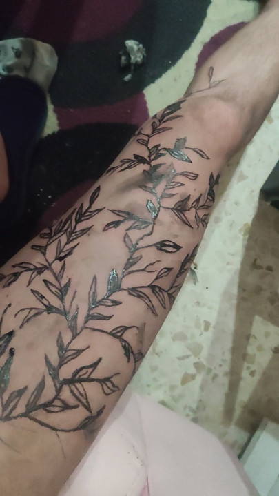 Tattooing his cock