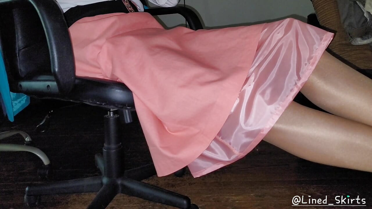Peach skirt with a slippery smooth satin lining.