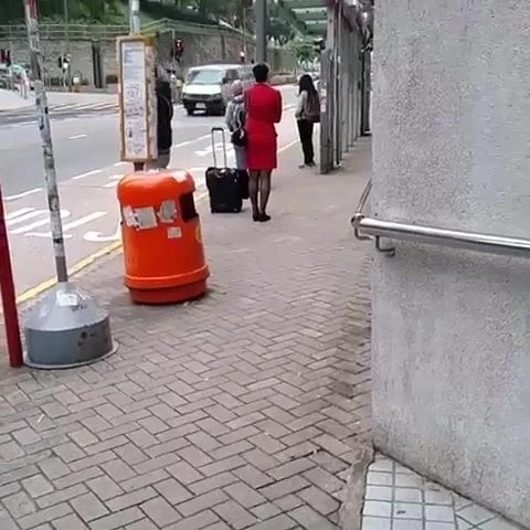 Flying Attendent waiting for bus