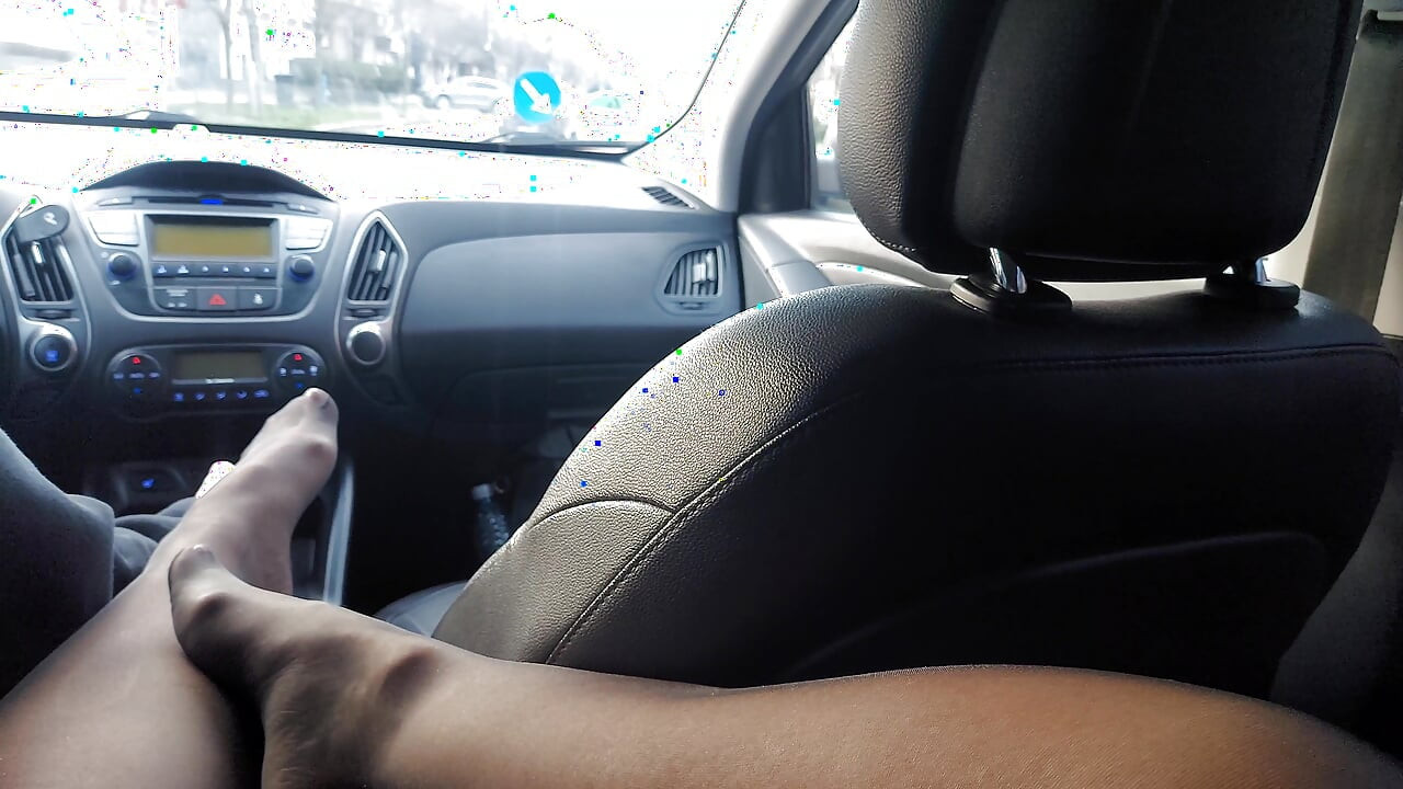 Hot milf teases a taxi driver in the car, in public, with her sexy legs in stockings