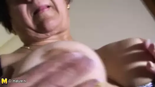 Amateur granny playing with herself on bed