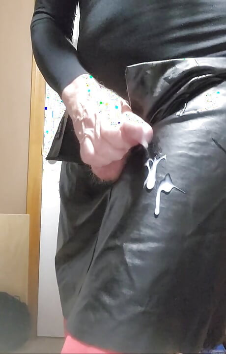 Crossdresser, masturbate and cum black leather skirt red pantyhose.