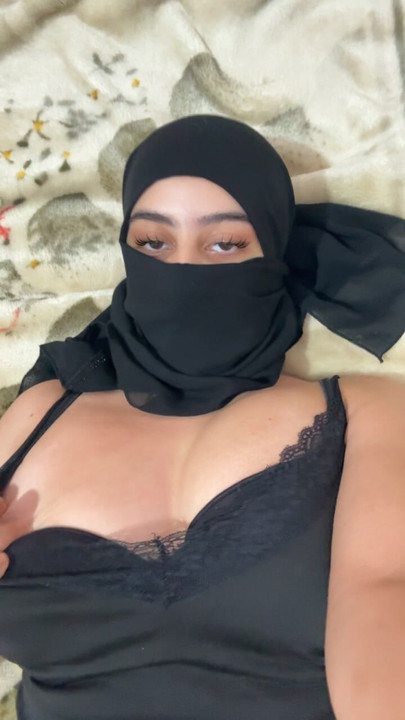Muslim Girl in Hijab Lays in Bed and Gently Squeezes Her Arab Boobs While Her Titties Bounce Softly