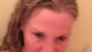 MILF getting a facial in the shower