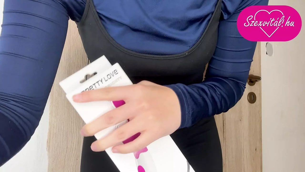 My stepsister  is showing me the vibrator he's going to try in the bathroom.