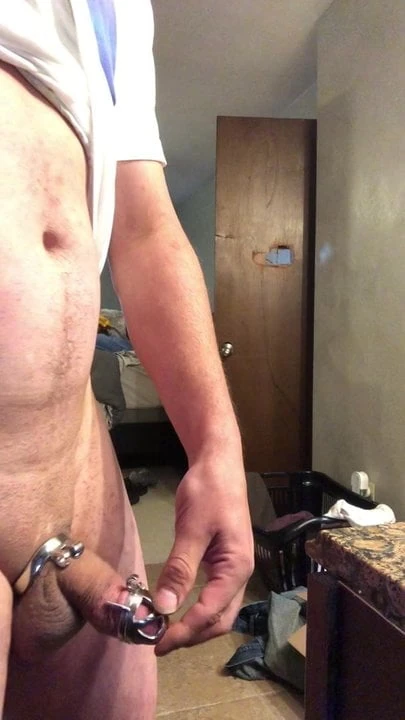 Bad boy stuffing his huge cock into a chastity