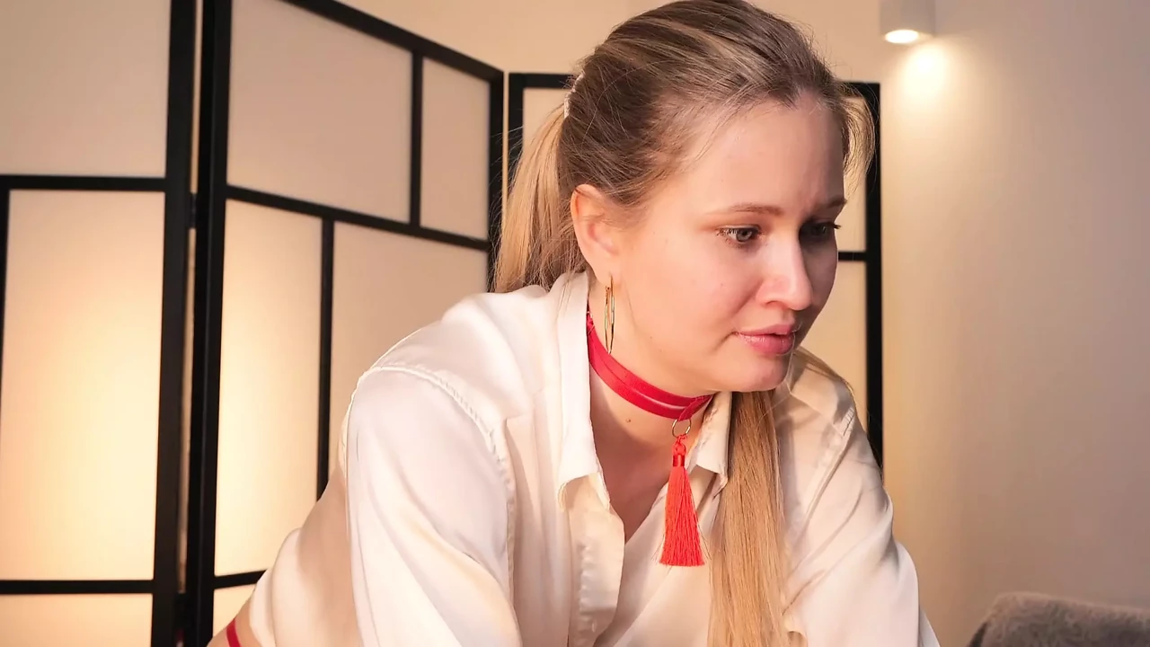 Her blouse is about to fall off