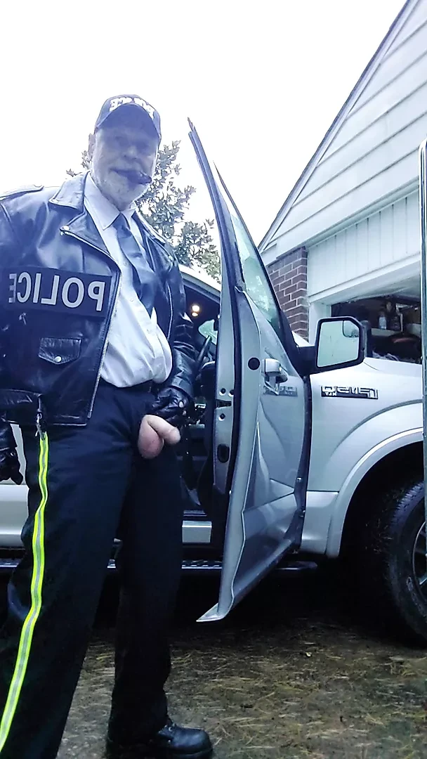 Officer smoking cigar while closing down work day