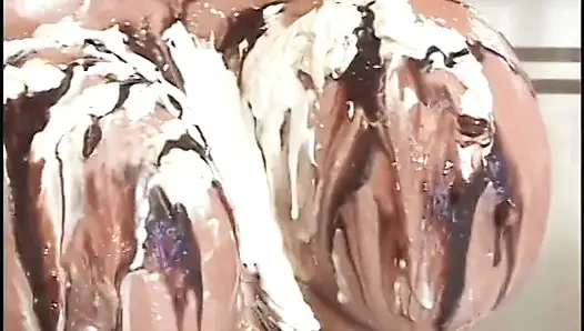 Huge boobs blonde gets a blast of jizz on her jumbos after foam games