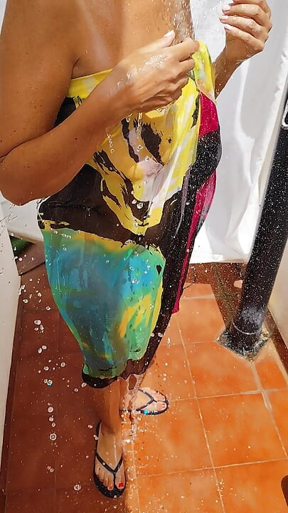 Big tits milf showers outside and shaves her pussy