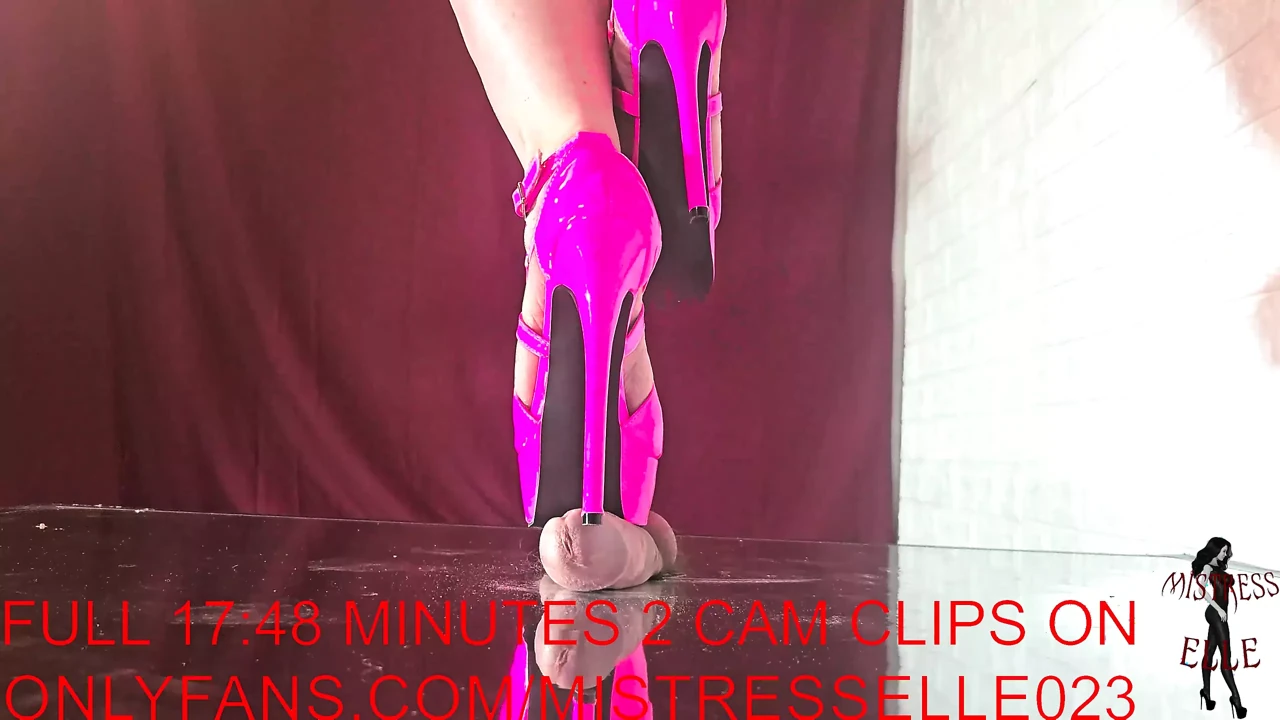 Mistress Elle tortures her slave’s cock with her pink high heels