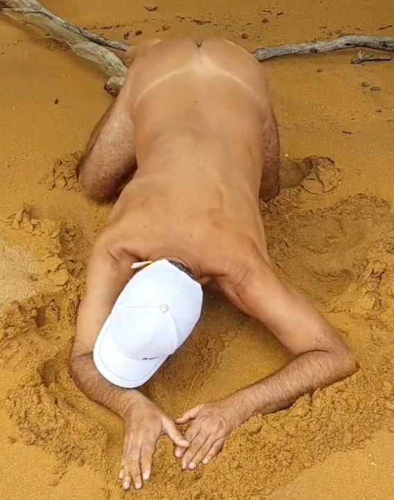 Ladysilva on all fours on the beach what a hot ass