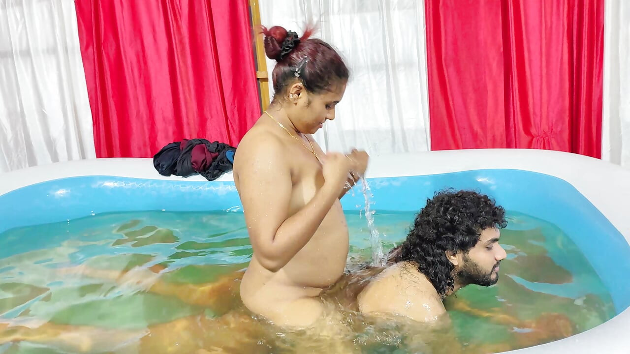 Girl romance with boy while bathing in pool
