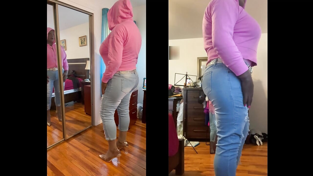 Black babe Danae as a butch bald strong black woman in ripped tight jeans