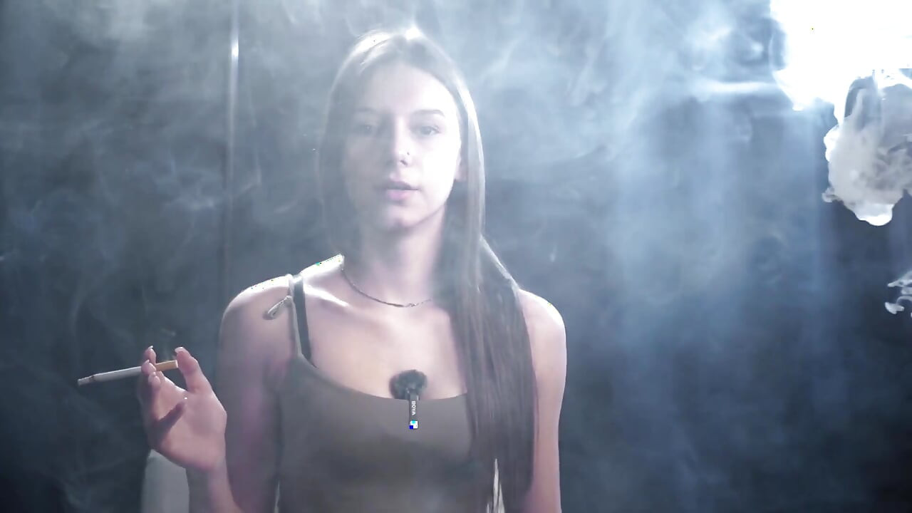 Calm Solo Smoking Session in Studio with Soft Smoke and Direct Eye Contact