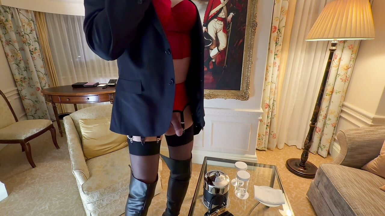 Sissy hooker masturbating in front of a client at a luxury London hotel