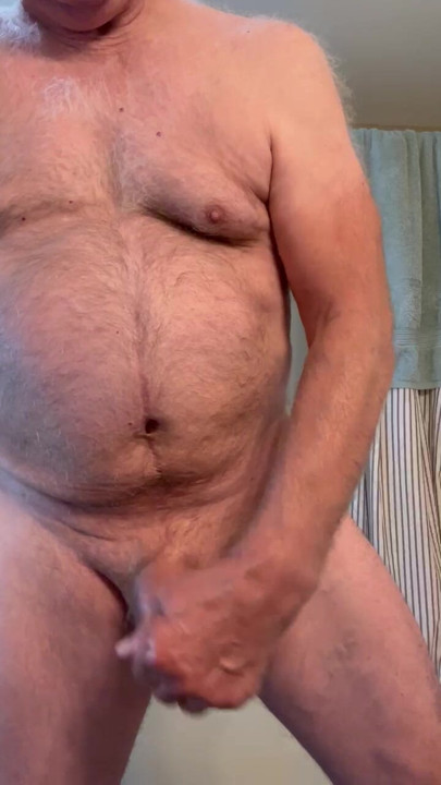 Handsome married Dad cumming and licking it up for the camera.  .