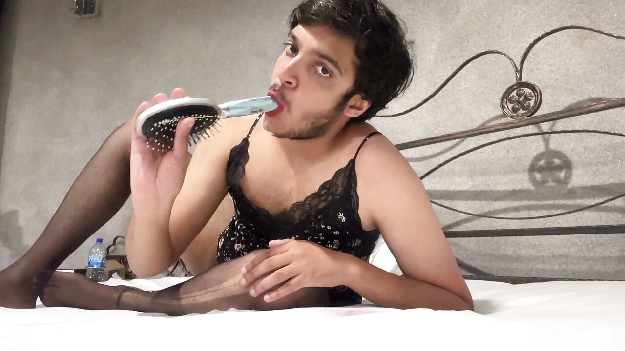 Sexy sissy slut in feminine clothing deep throats her toy then begins fucking herself to orgasm