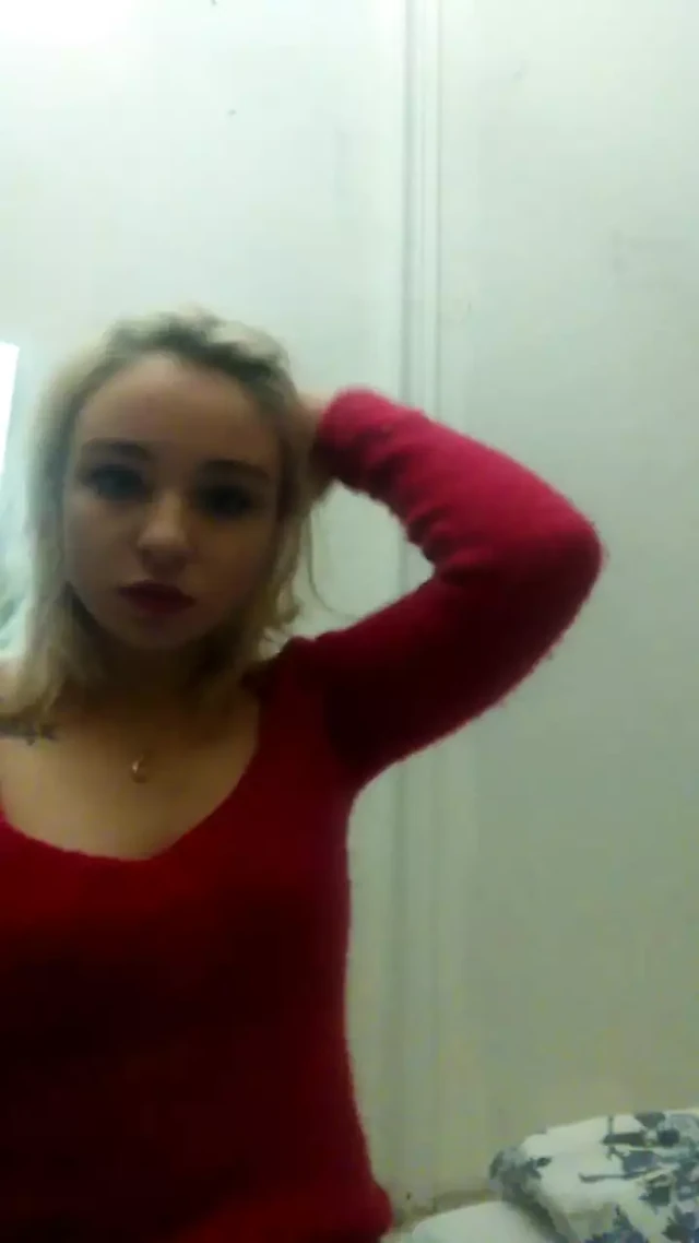 Lovely tender charming homemade striptease in a red sweater