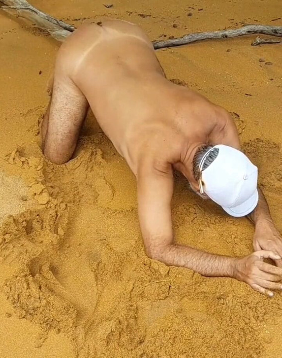 Ladysilva on all fours on the beach what a hot ass