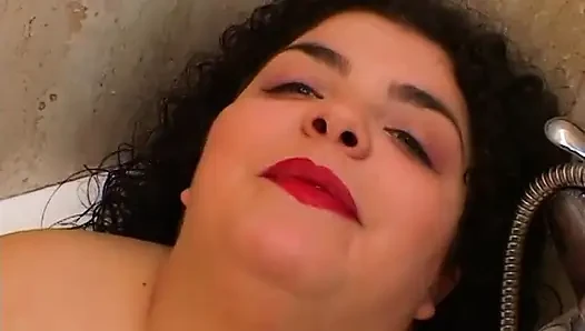 Brunette masturbates in the bathroom