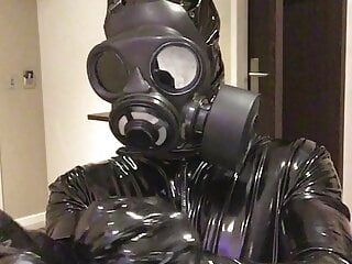 gasmask and catsuit dressing