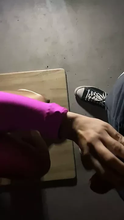 Footjob in shiny pantyhoses and pink spandex leotard