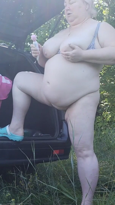 Mother-in-law masturbates her pussy in nature | Clip 1