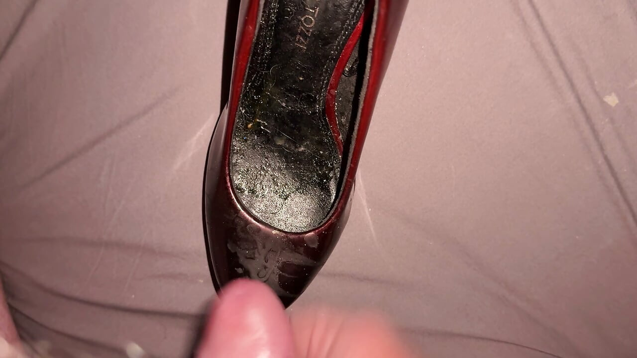Cumming on red and black patents
