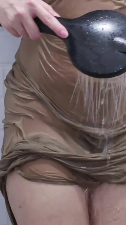 POV: Watch A Naughty Malaysian Hijabi Getting Wet In The Shower With Sheer Dress Showing Of Her Body | Clip 1