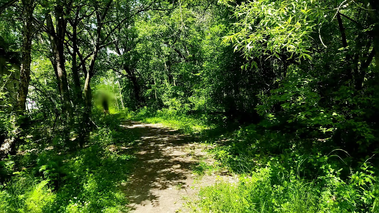 Jogging without pants in a forest park. Old video