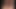 Güzel memeli harika orta yaşlı seksi kadın güneşlenirken havuz başında ayaklarına masaj yapıyor