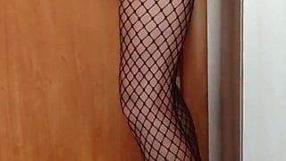 MILF in stockings rides a cock on the wall