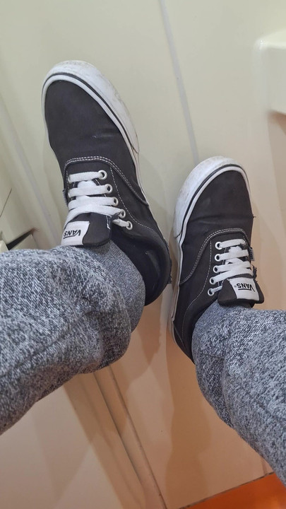 Showing my old VANS shoes in train toilet