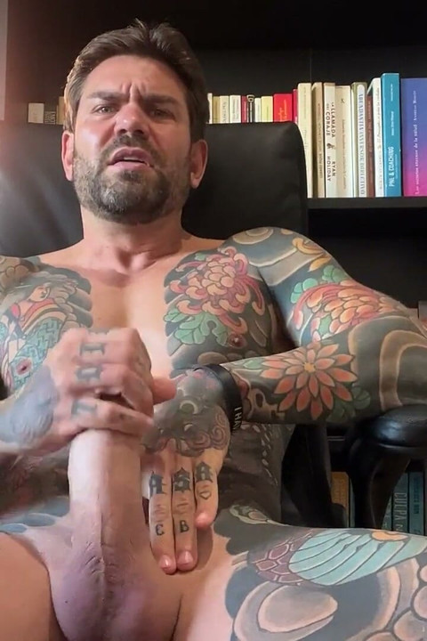 Tattooed Boss Masturbates in the Office