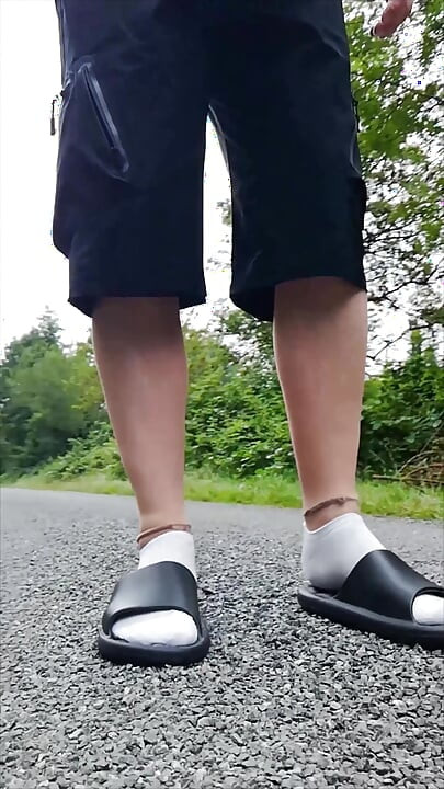 In Slippers and White Socks in Nature