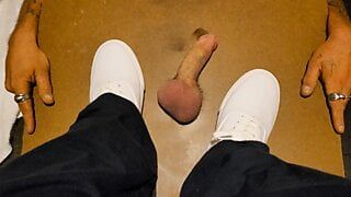 Squishing his cock with white keds