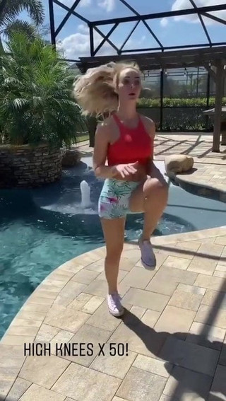 WWE - Peyton Royce exercising by the pool