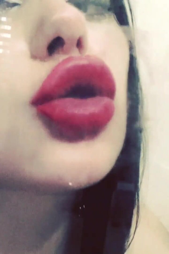 Red lips prints over glass & frenchkissing