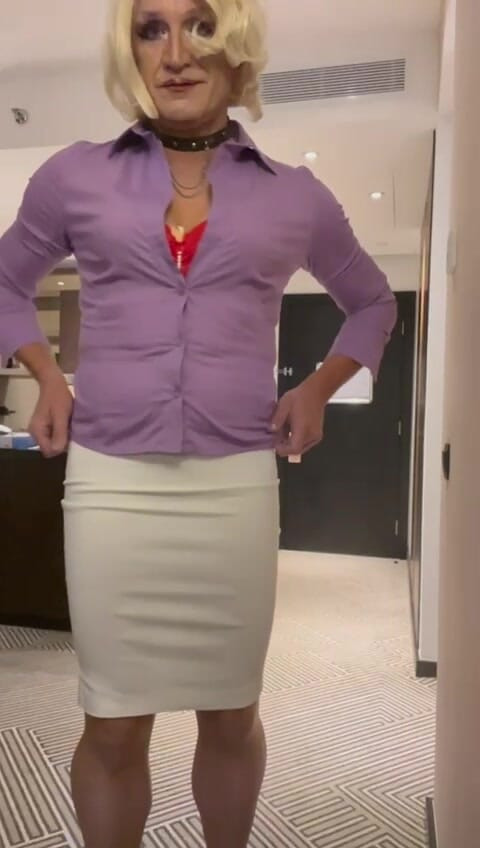 Blondie in pink blouse and pencil skirt