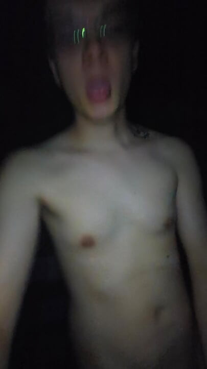 solo stroking outdoors next to the woods
